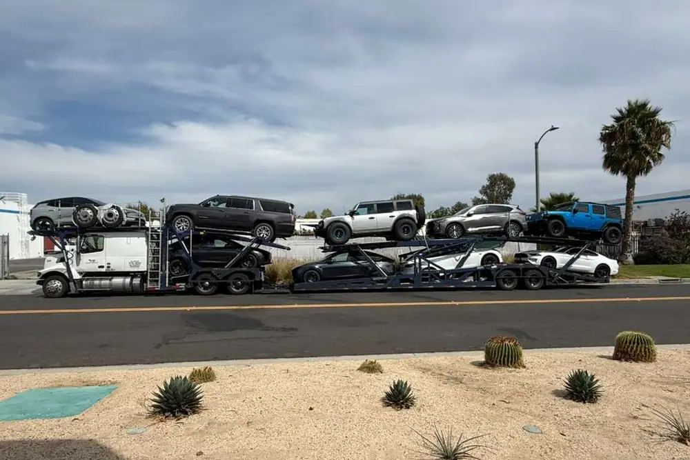 An owner-operator's car hauler loaded with a full run of vehicles